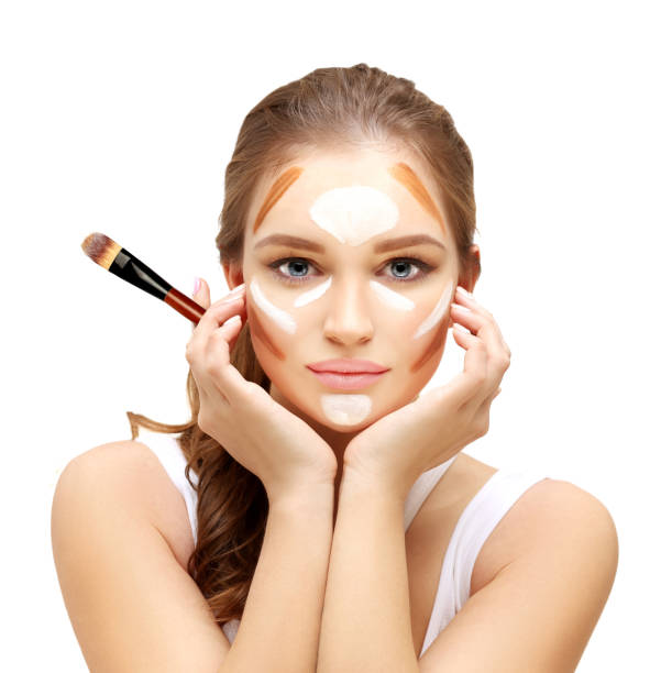 istock Putting makeup ,Contouring.Make up woman face. 1486606774