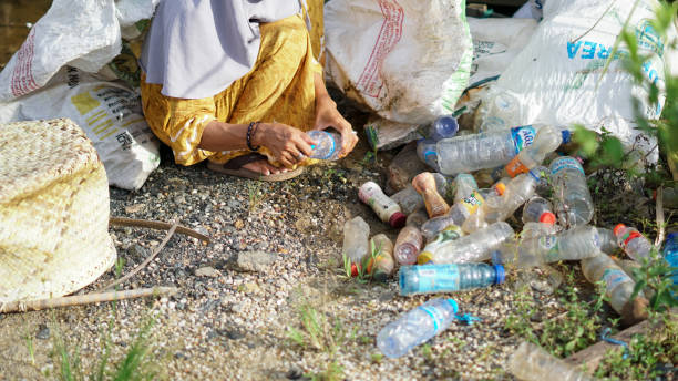 istock woman cleaning plastic waste around the house 1486609811