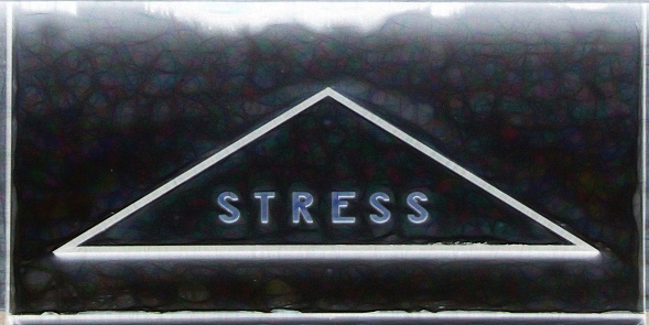 grunge style capital letters STRESS as text within a triangle shape in monochrome within a grey frame