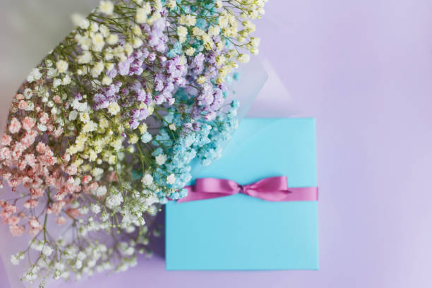 istock Rainbow gypsophila bouquet and gift box 1486619718