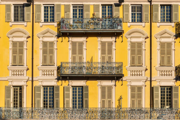 Colorful old building facades in Nice, France stock photo