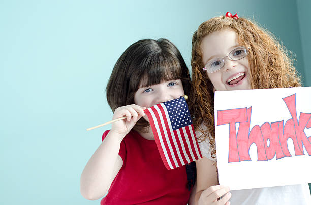 istock girls show their thanks to the armed forces 148662818