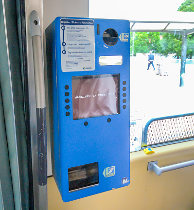 Gothenburg, Sweden -  31 20_D: Blue ticket machine aboard a tram