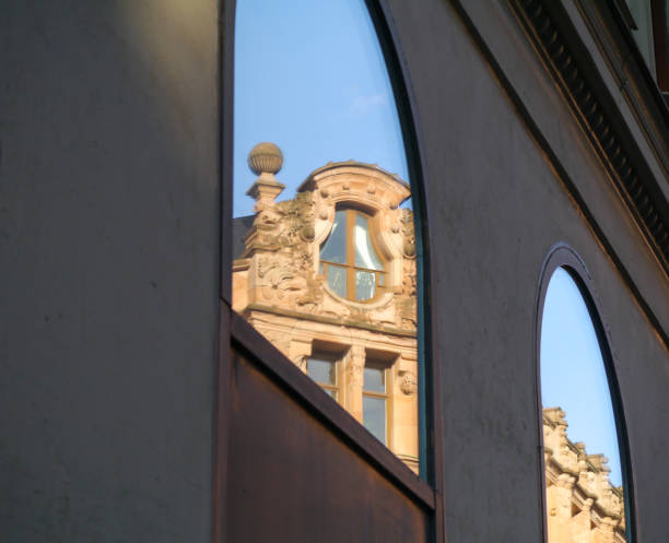 istock Reflection of a building in a window 1486632433