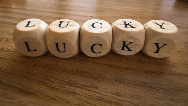 istock Lucky wooden text on a wooden background 1486636720