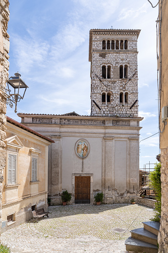 Narrow alley with church facade in a medieval hilltop town in the Province of Rieti.