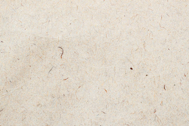 istock Light recycled paper background. Old craft texture 1486638746