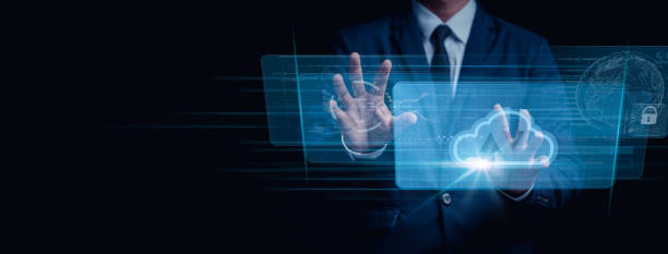 istock Businessman used Virtual Reality glasses. connecting to the Internet through a notebook computer to upload and download data. Secure data network digital cloud computing cyber security. Big data 1486643486