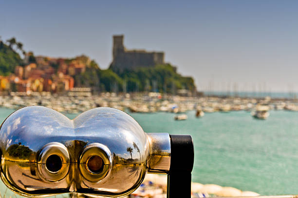 istock binocular pointing at Lerici village, in Liguria 148664521