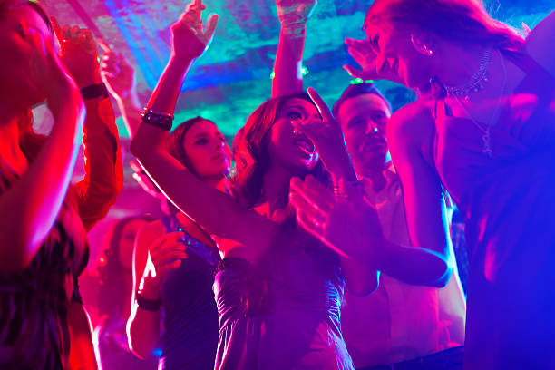 istock Party people dancing in disco or club 148664690