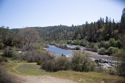Pilot Hill, CA, USA - April 3, 2022:  Vistas of Corcoran Ranch rolling hills and American River.