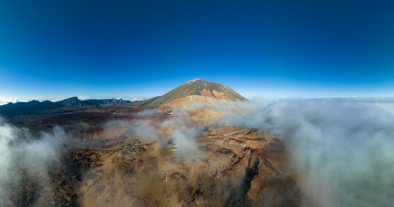 Teide National Park is on Tenerife, the largest of Spain’s Canary Islands. It's named for Mount Teide, a towering volcano and the highest peak in Spain. Trails and the Teide Cable Car lead to the summit. To the west, Pico Viejo has crater views. The unusual rock formations of Roques de García include the iconic Roque Cinchado column. Southwest, a traditional shepherd’s home is now the Juan Évora Ethnographic Museum.