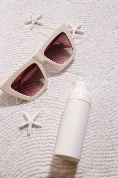 istock Spf sun protection spf bottle mockup on sand 1486648791