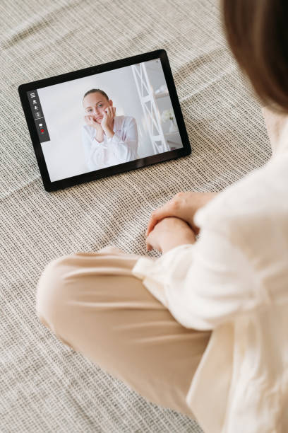 istock video talk virtual chat female friend on tablet 1486662139