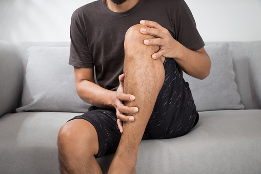 Man having leg muscle pain