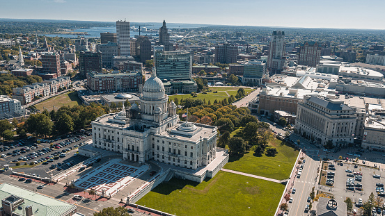 View of Capitol Hill with Rhode Island State House and streets of Providence behind. The marble dome of the State House is the forth-largest self-supporting marble dome in the world.