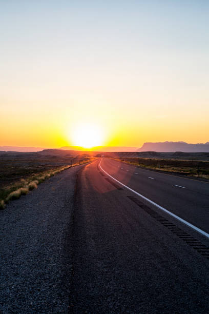 istock Western USA Sunset on Remote Wilderness Highway 1486667830