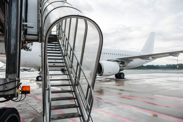 Hamilton Island, Australia - October 3,2015: Passengers disembark a Jetstar Airbus A320 from Sydney. Hamilton Island  is the only island on the Great Barrier Reef with its own airport.