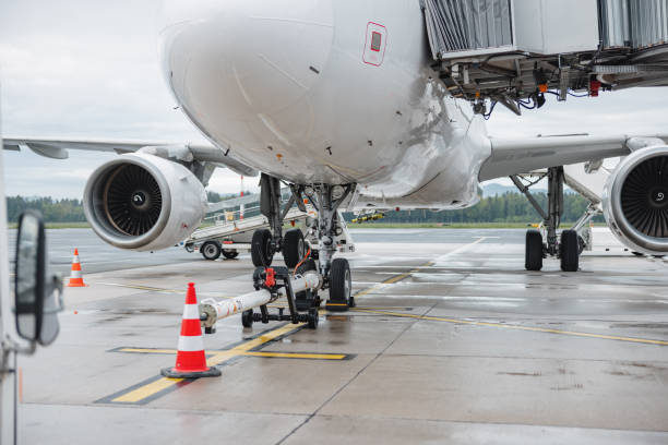 istock White Passenger Airliner On The Airport Apron 1486670539