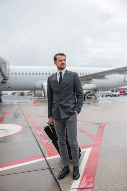 istock Portrait Of A Businessman Boarding A Flight 1486670593