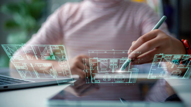 istock Businesswoman Architect or Interior Designer working with modern futuristic virtual layout home. Blueprint 1486681451