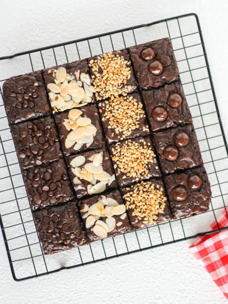 istock Chocolate brownies with various topping. 1486682552