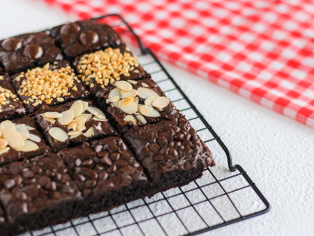 istock Chocolate brownies with various topping. 1486682667
