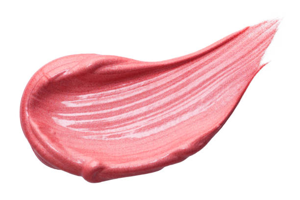 istock Lip gloss sample isolated on white. Smudged pink lipgloss. 1486687722