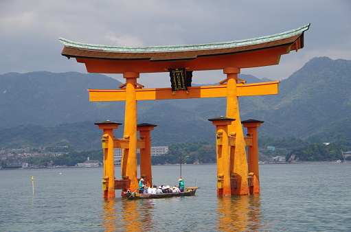 Hiroshima, Japan –May 1, 2014: This is the torii gate of Itsukushima Shrine in Hiroshima, Japan.It is located in Miyajima, Hatsukaichi City, Hiroshima Prefecture. There are two torii gates, one is the \