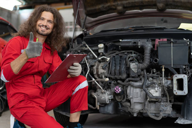 istock Auto mechanic working in vehicle repair service garage. 1486692573