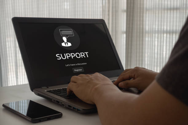 istock Helpdesk Technical Support Information Concept. business person typing on laptop to register issue, hotline assistance service available chat, online to solve incident with computer software. 1486706273
