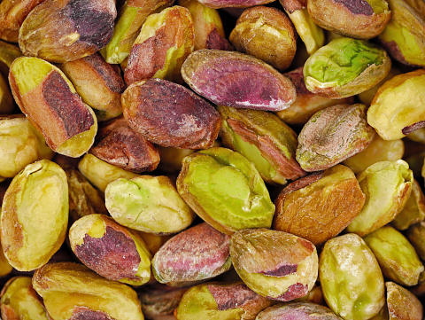 Close up of unsalted natural pistachio nuts at the farmers market.