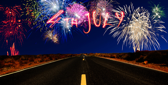 Fireworks over desert road. California, USA.