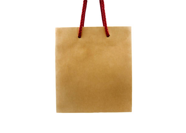 istock Brown shopping bag with red rope isolated on white background 1486733967