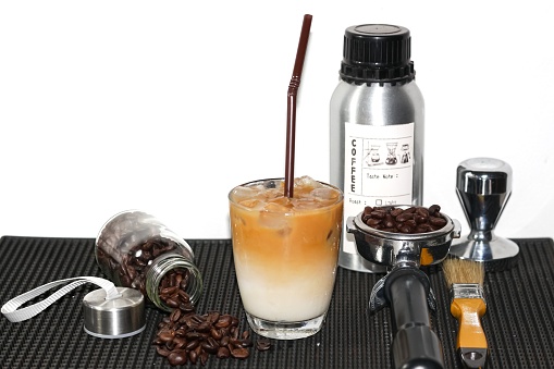 Latte Ice Coffee,delicious and good taste,coffee beans,tamper,lemon,bamboo bar matrefreshing and good feeling,concept picture for copy space and background.