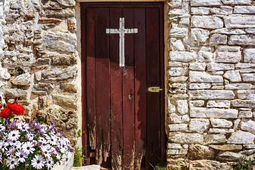 The entrance door of Orthodox monastery Saints Asomatos in Penteli, a mountain to the north of Athens in Greece.