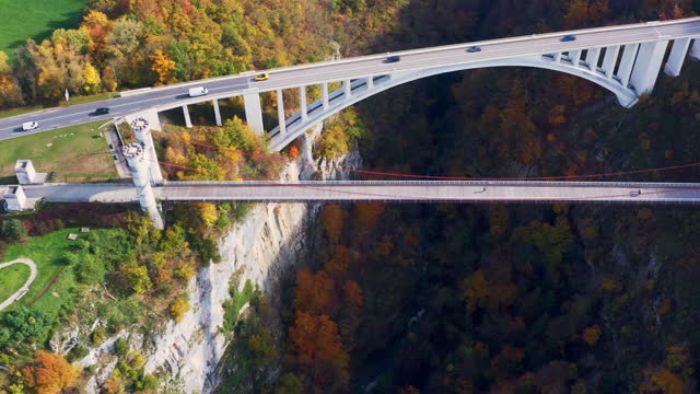 Drone aerial view of Pont De La Caille  Caille arch bridge and Charles Albert Bridge connect to area between beautiful vally hill ,famous and history travel destination spot view of  Rhône-Alpes France