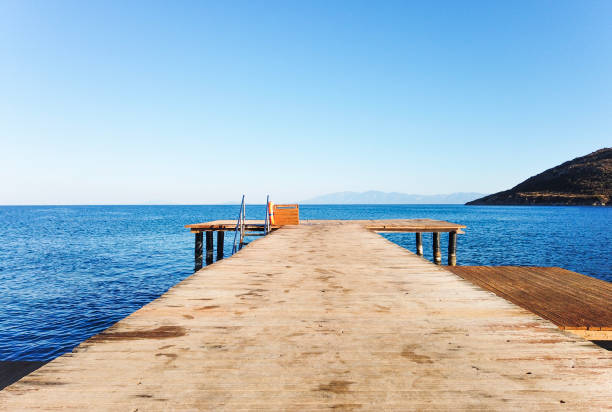 istock Wooden platform and sea landscape 1486740059