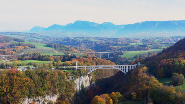 Drone aerial view of Pont De La Caille  Caille arch bridge and Charles Albert Bridge connect to area between beautiful vally hill ,famous and history travel destination spot view of  Rhône-Alpes France