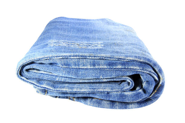 istock Blue jeans old condition folded isolated on white background with clipping path. 1486743785