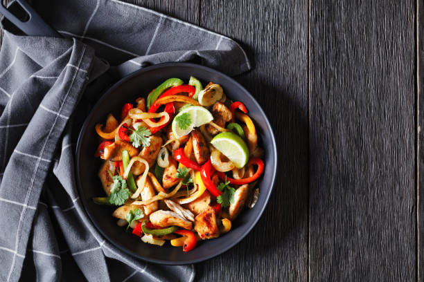 istock chicken fajitas with bell peppers, onion, spices 1486747953