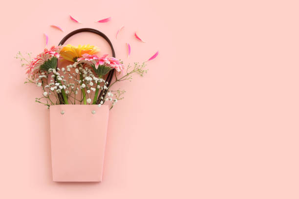 istock Top view image of beautiful flowers composition over pastel pink background 1486749036