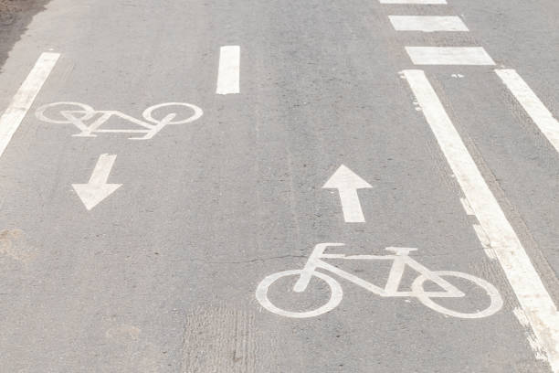istock markings on the bike path in the park 1486749369