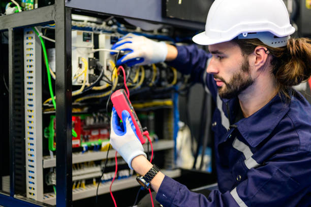 istock Technician with white helmet checking and repairing part 1486751652