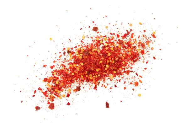 istock Chili powder isolated on white background. 1486751713