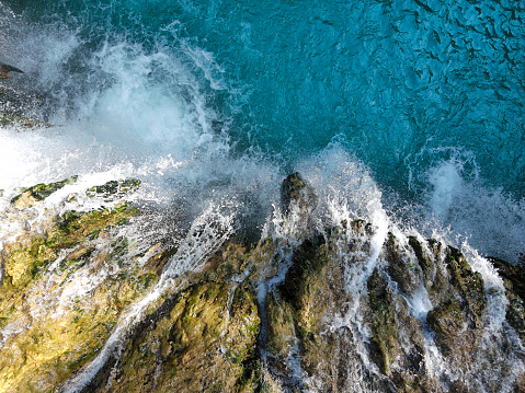 aerial view of a waterfall produced by the elsa river in tuscany