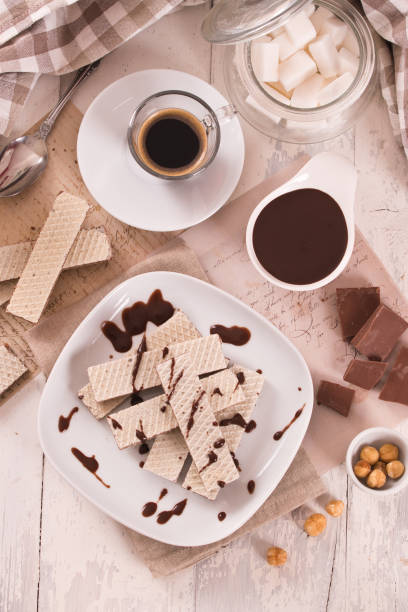 istock Neapolitan wafers filling with hazelnut-chocolate cream. 1486758805