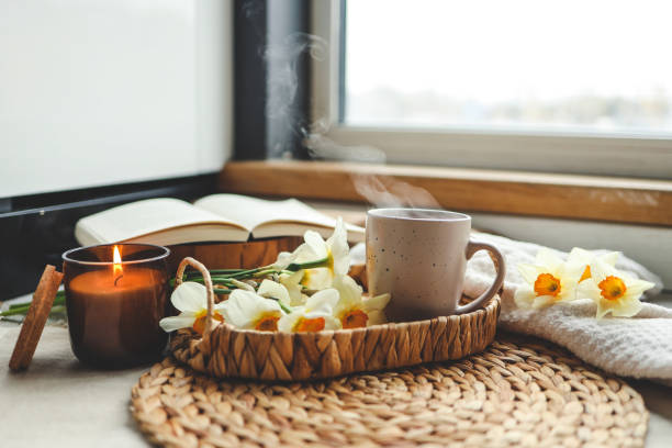 istock Cup of hot tea and spring home interior. good morning concept 1486760232