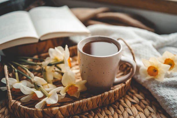 istock Cup of hot tea and spring home interior. good morning concept 1486760234