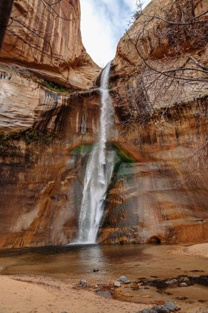 istock Idyllic landscape featuring a large waterfall cascading over a hillside. 1486760449